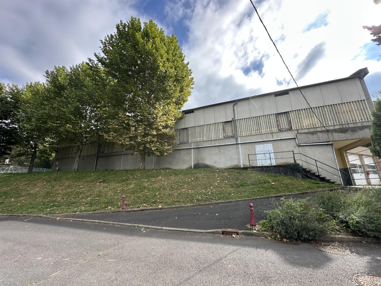 brown concrete building near sea during daytime