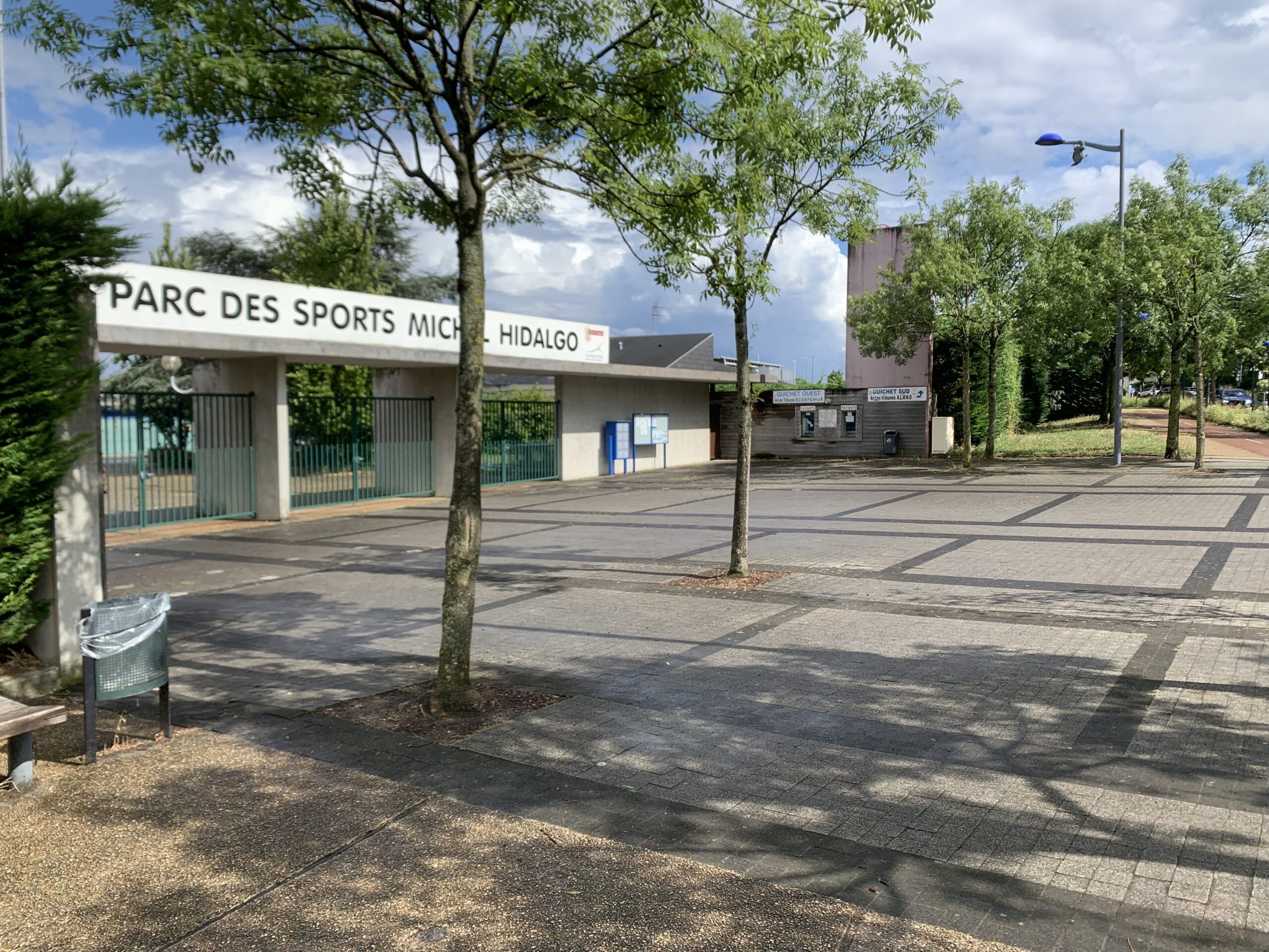 brown concrete building near sea during daytime
